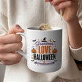 White handled mug with Grandmas Love Halloween lettering, pumpkins, bats, and a witch hat.
