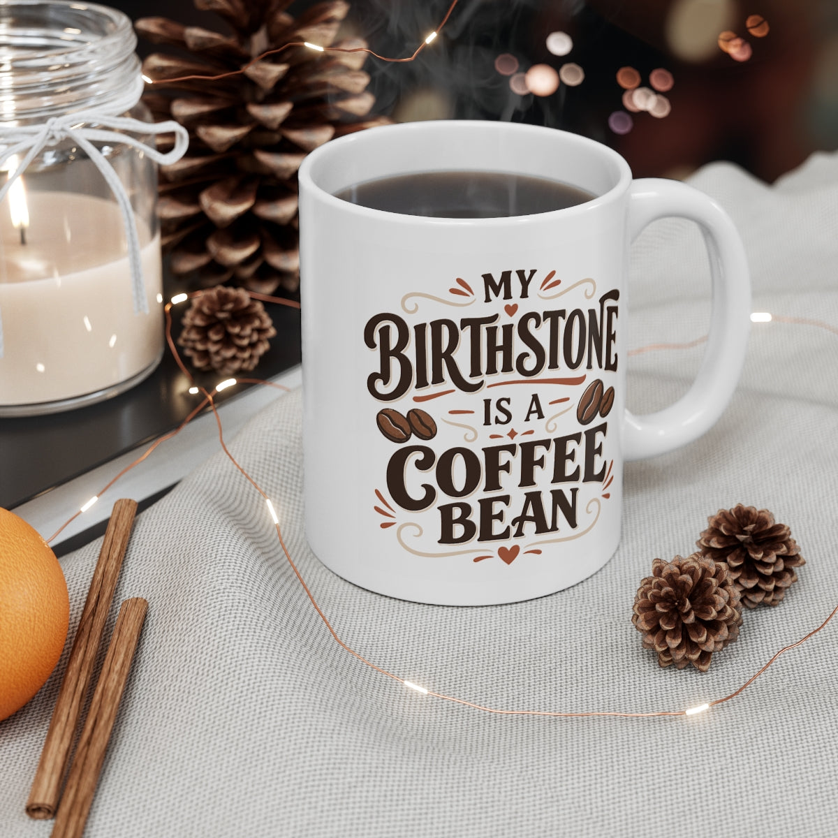White mug with My Birthstone Is a Coffee Bean lettering and coffee bean illustrations